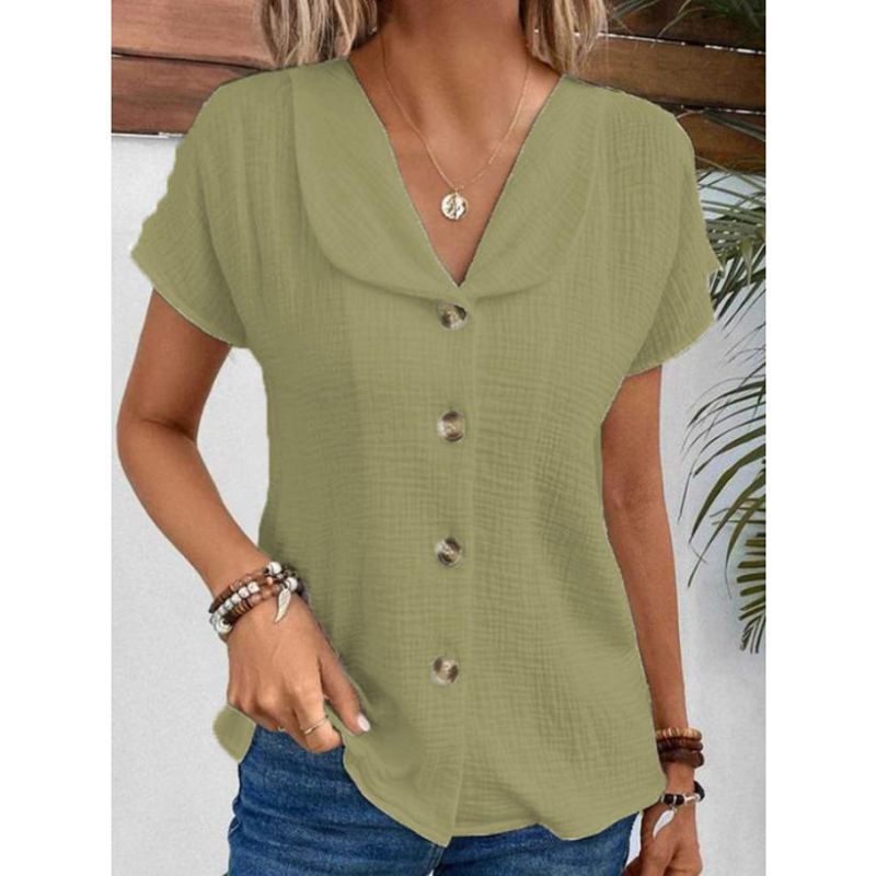 Damebluse med synlige knapper lavet af let stof Stilla