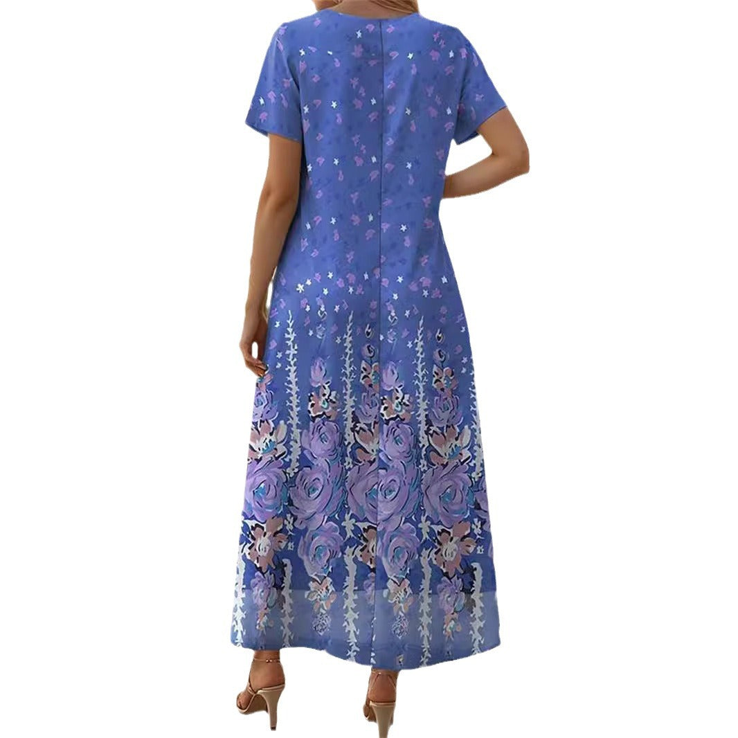 Dame maxikjole med floralt design og sidelæg Stilla