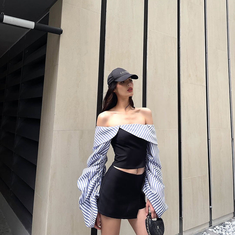 Dame Off-Shoulder Top med voluminøse flæseærmer og stribet design Stilla