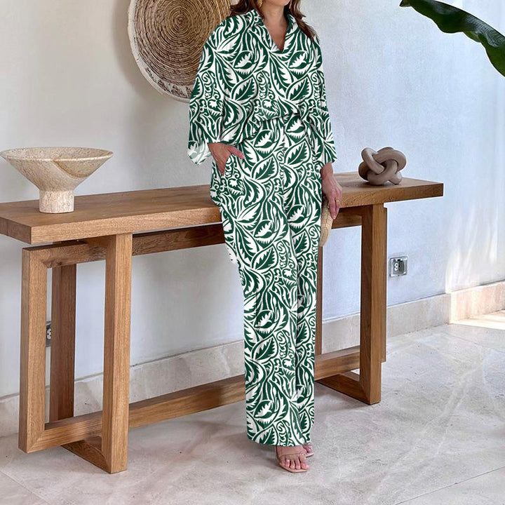 Dame Elegant og luftig strandkombination med florale mønstre Stilla