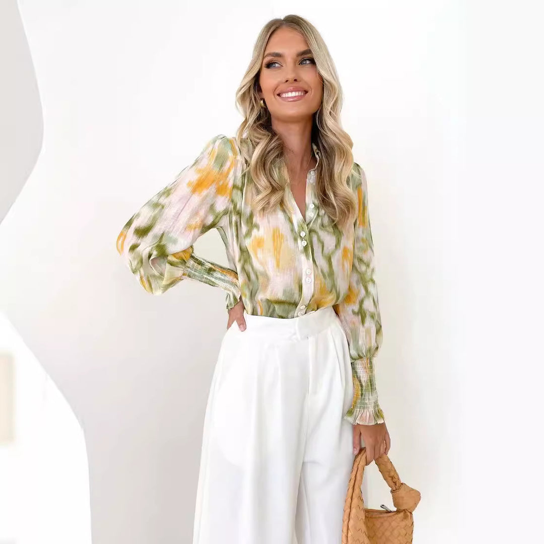 Damebluse med elegant farveovergang og trendy pufærmer Stilla