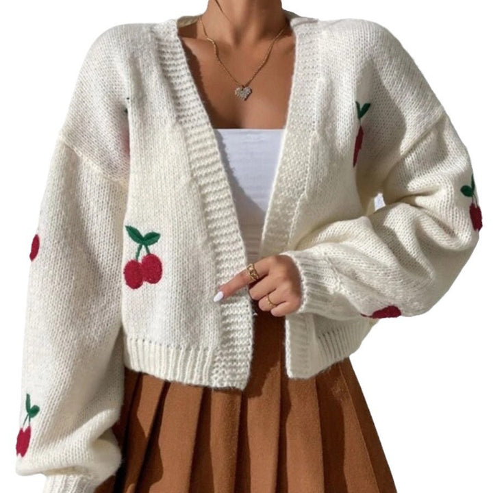 Kvinders cardigan med blomstermotiv og ekstravagant silhuet Stilla
