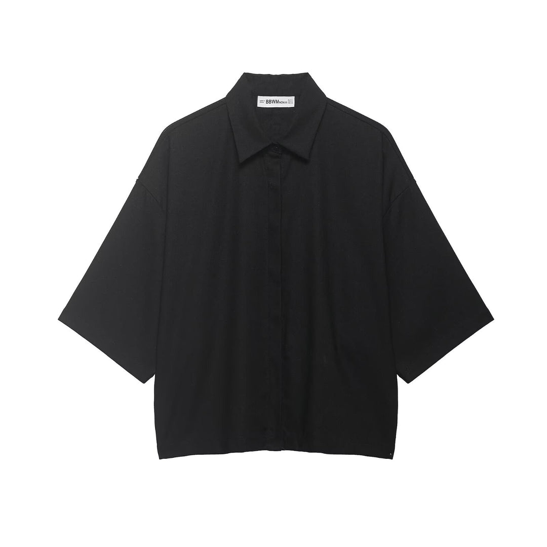 Dame Oversized-bluse med moderne snit og praktiske knapdetaljer Skovae