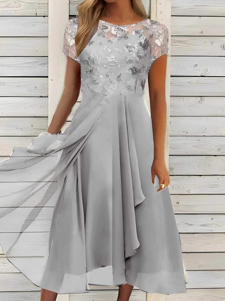 Dame nan flydende chiffon-midi kjole med blomsterbroderet overdel og asymmetrisk lagdelt nederdel Skovae