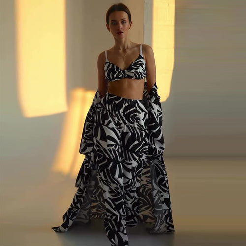 Kvinders strandoutfit med trendy blomsterprint Skovae