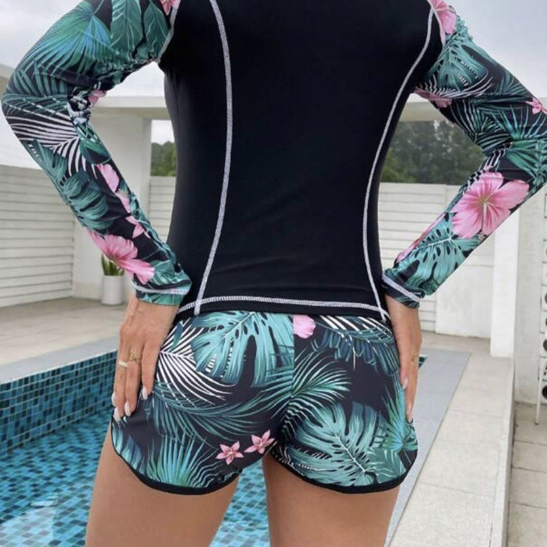 Dame langærmet sport-badesæt med blomsterinder og shorts Stilla