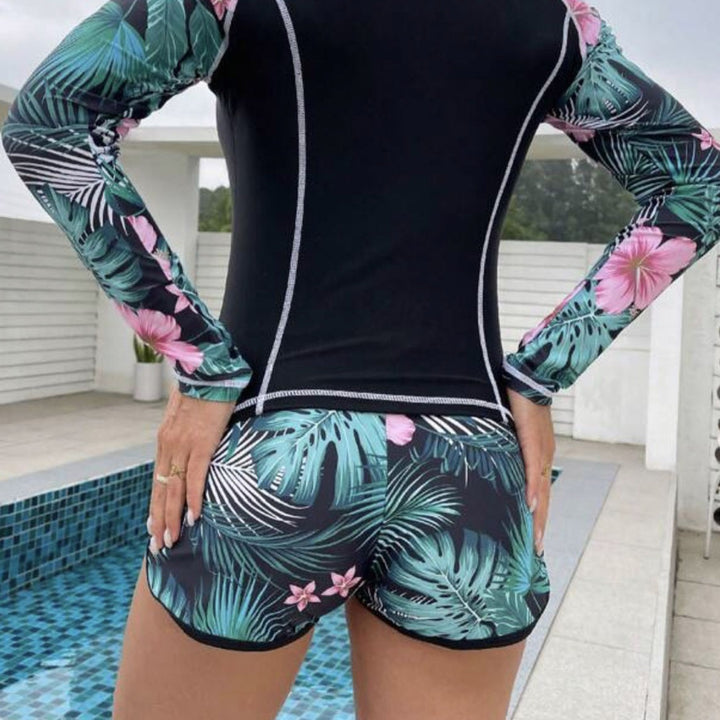Dame langærmet sport-badesæt med blomsterinder og shorts Stilla