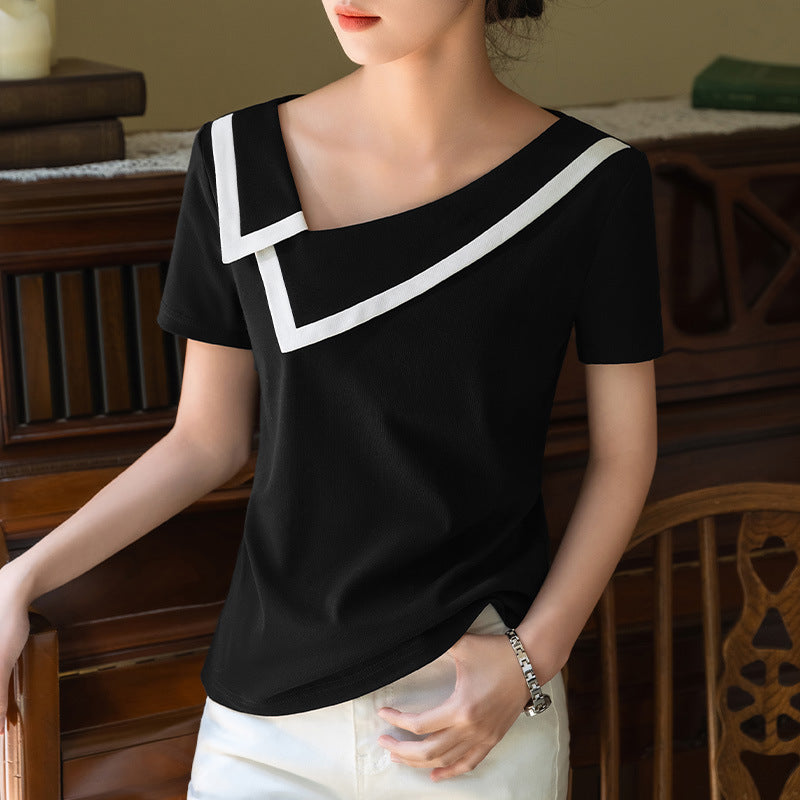 Dame elegant top med en moderne asymmetrisk krave og stilfulde kontrastaccenter Stilla