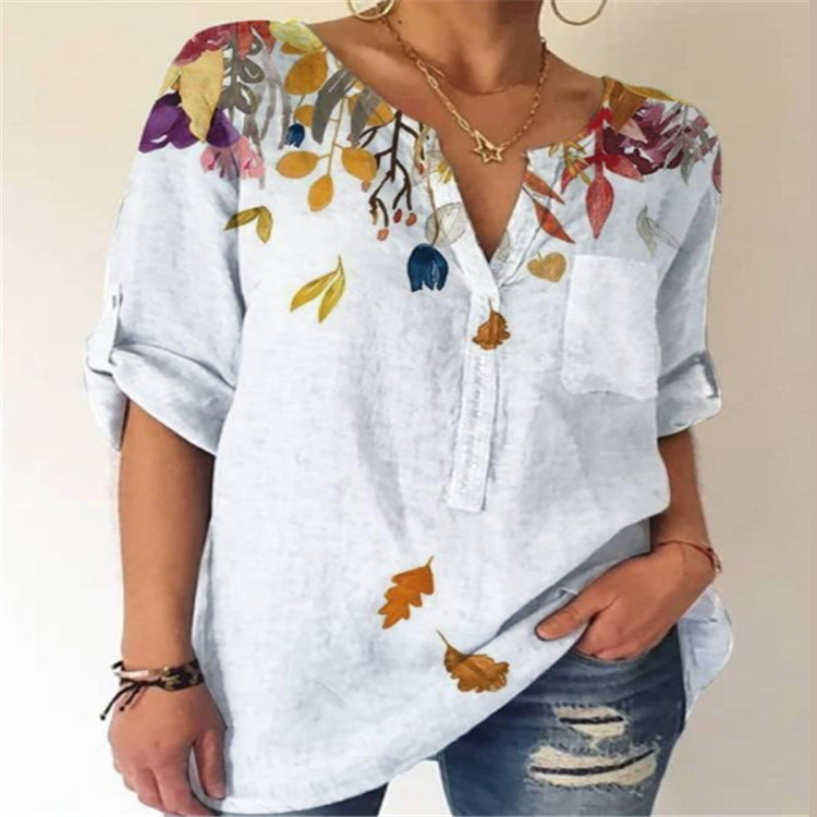 Damebluse med floral broderedesign og V-hals Stilla