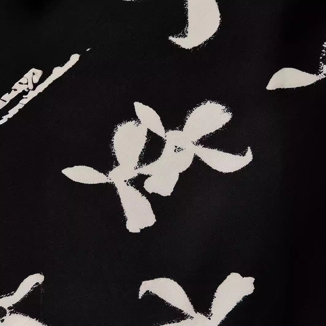 Dame Midiskørt med blomsterprint i kontrastfarvet design Stilla