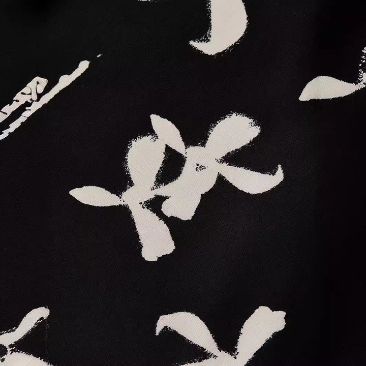 Dame Midiskørt med blomsterprint i kontrastfarvet design Stilla