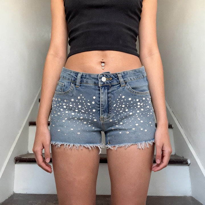 Dame jeans shorts med glitrende applikationer og frynset kant Skovae