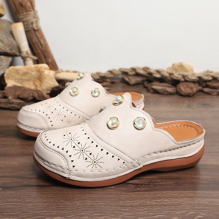 Dame Slip-On Clogs med Modeperforering og Elegante Dekordetaljer Stilla