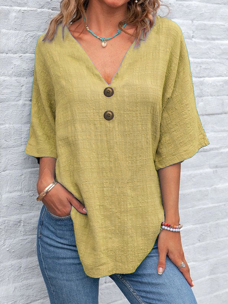 Dame V-hals bluse med knapdetaljer Skovae