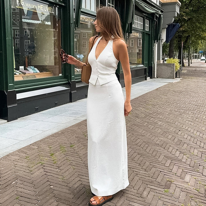 Dame elegant kombination af ærmeløs top og lang nederdel i minimalistisk stil Stilla