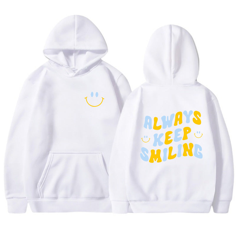 Dame hoodie med munter skrift og praktiske kangaroo lommer Skovae
