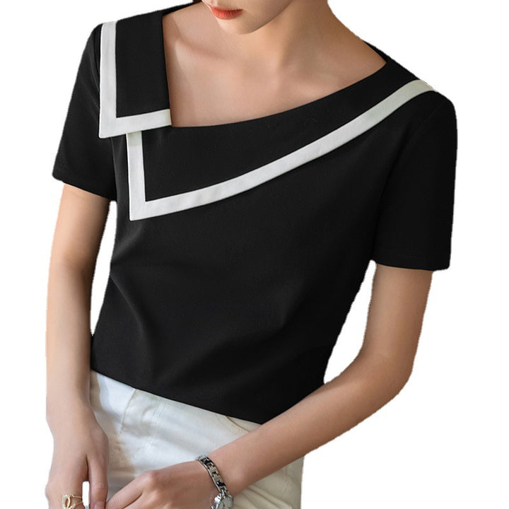 Dame elegant top med en moderne asymmetrisk krave og stilfulde kontrastaccenter Stilla