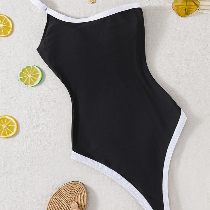 Dame One-piece badedragt med kontrasterende accenter og moderne snit Skovae