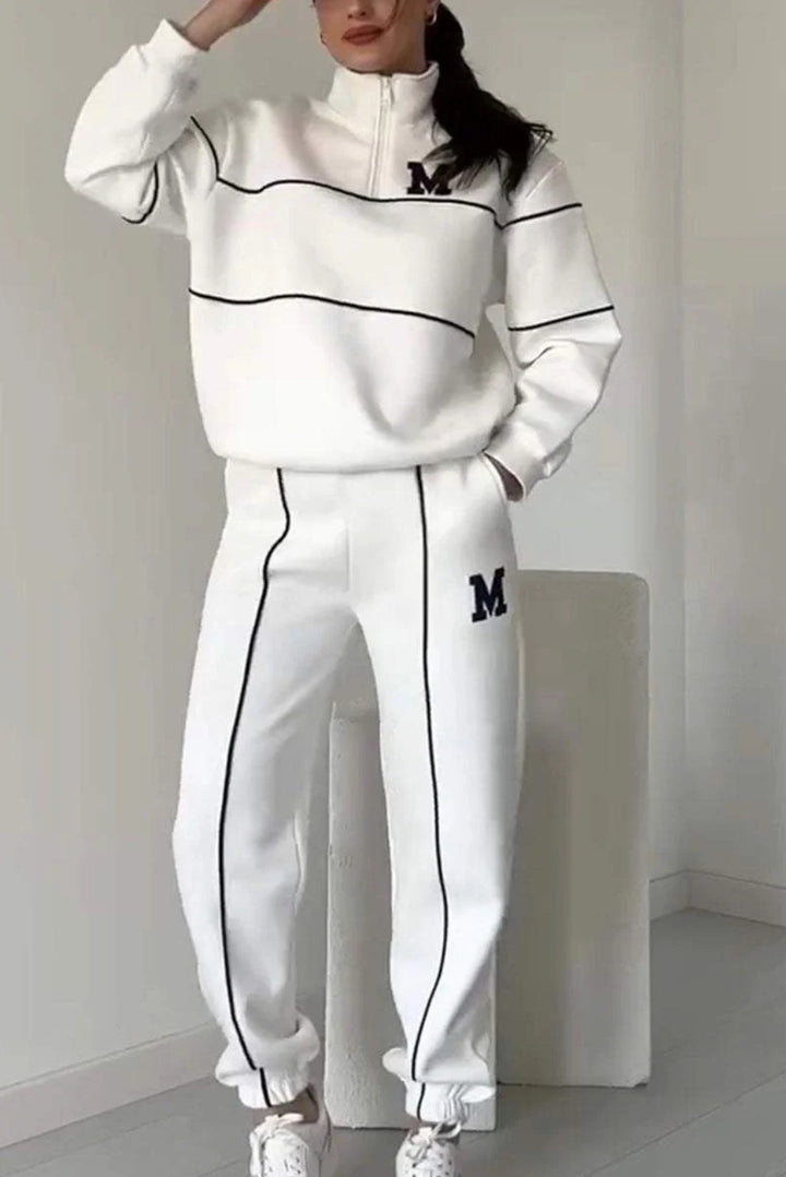 Kvinders sporty loungewear-sæt med halv lynlås og elastisk talje Stilla