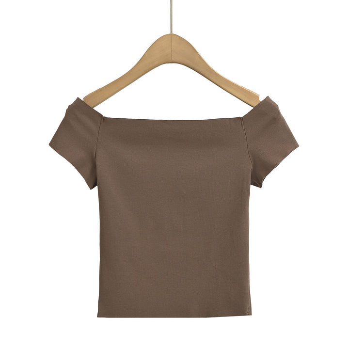 Dame top med smart off-shoulder-design og delikate puffærmer Stilla