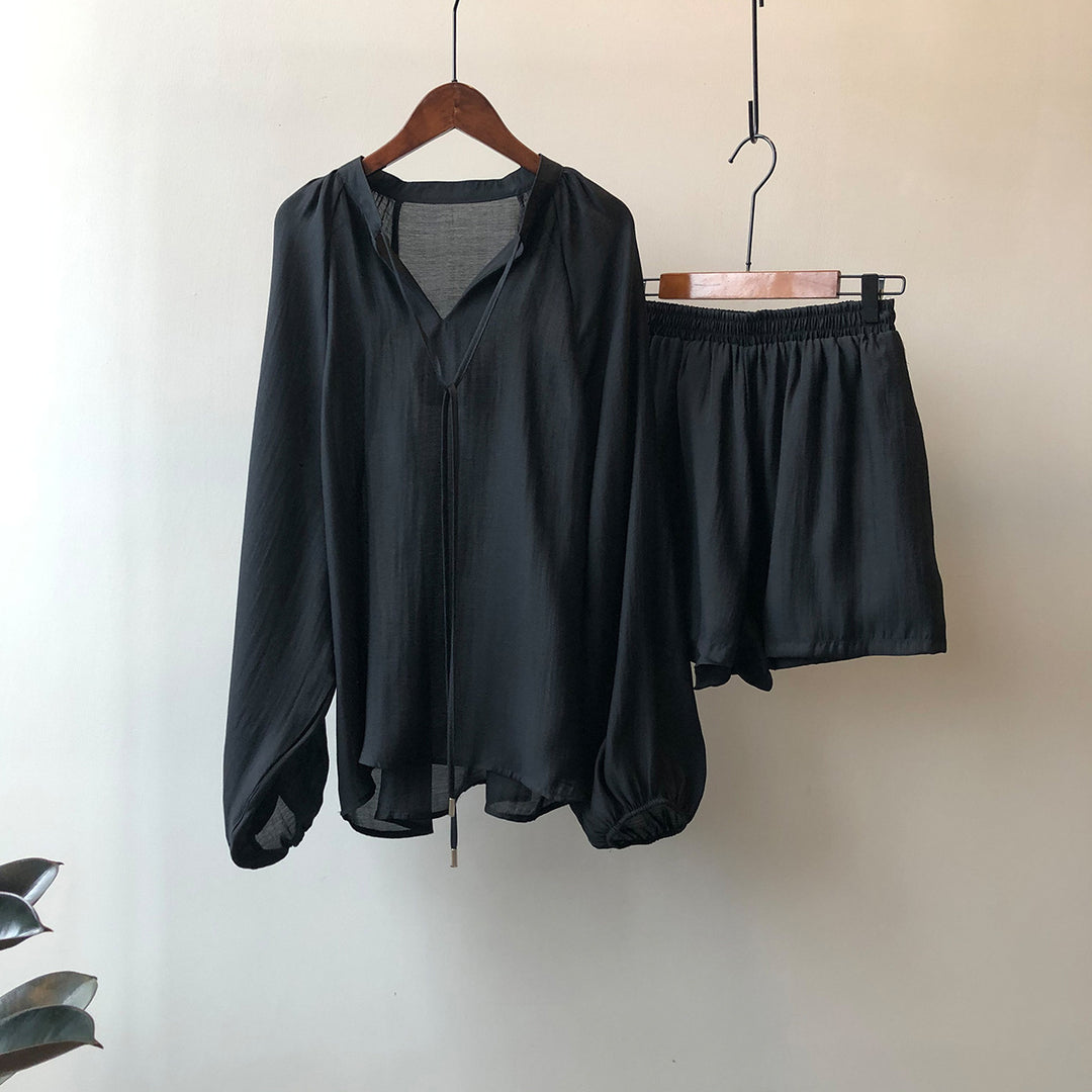 Dame luftig bluse sæt med bred pasform og elastiske shorts Stilla