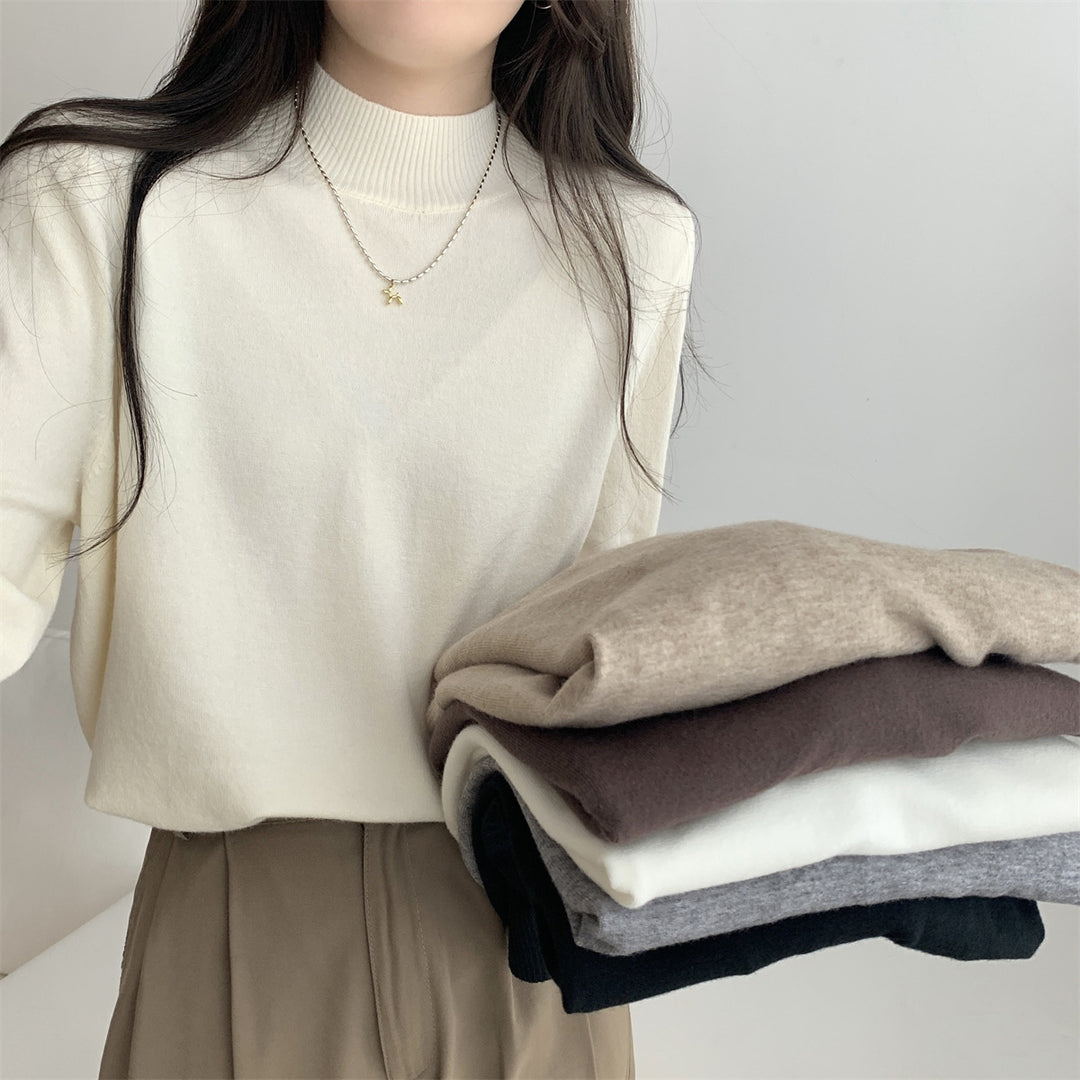 Dame finstrikket sweater med moderne ståkrave og afslappet pasform Stilla