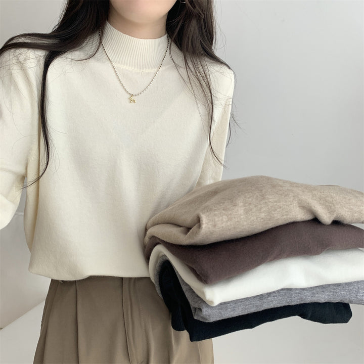 Dame finstrikket sweater med moderne ståkrave og afslappet pasform Stilla