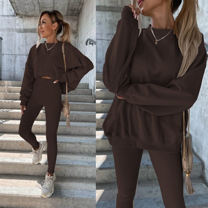 Kvinders sporty fritidssæt med afslappet oversized sweatshirt og tætsiddende leggings Skovae