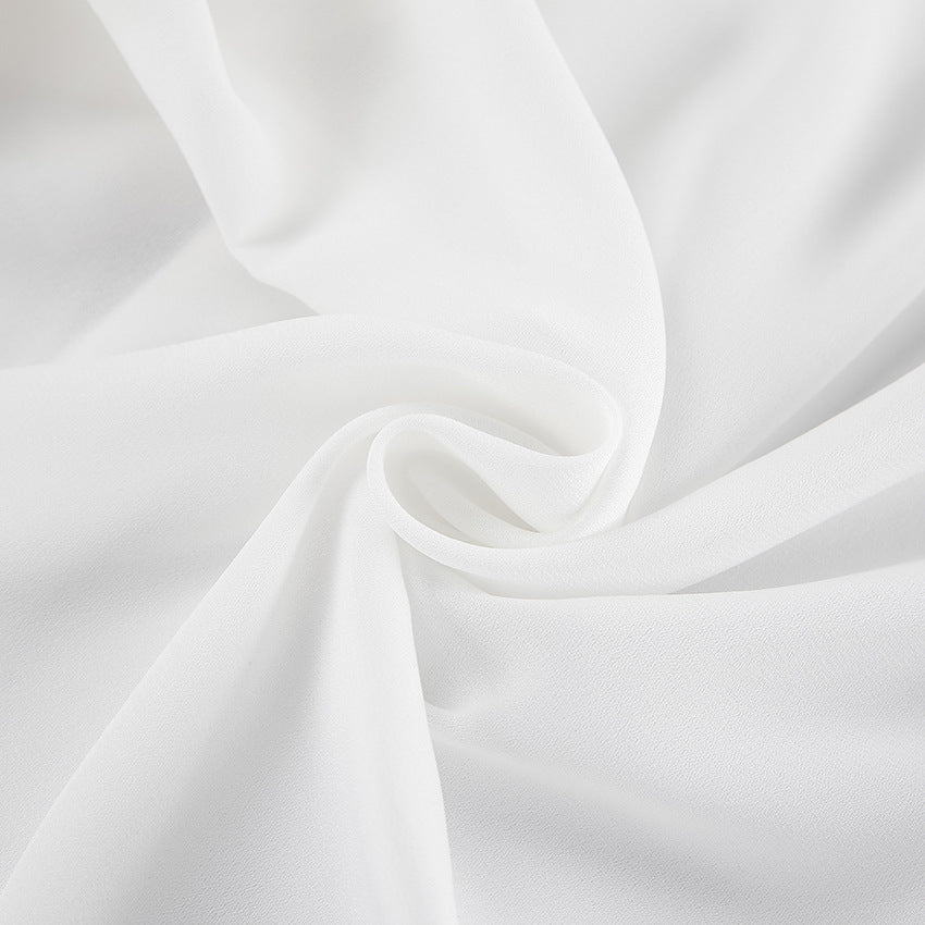 Damebluse med volumniøse flæser og elegante ærmer Stilla