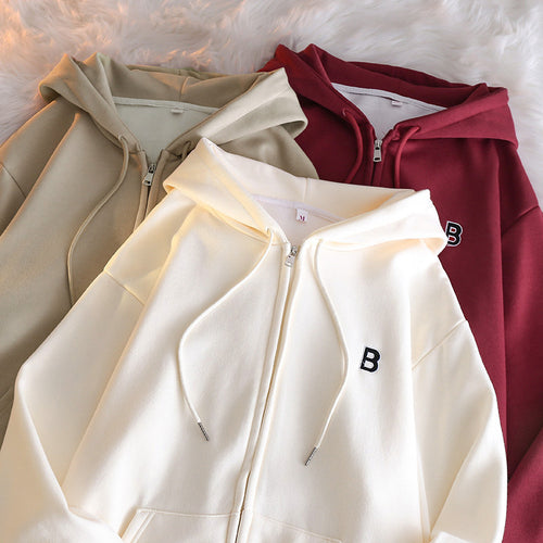 Femme Cozy Zip-Up Hoodie med elegant broderet detalje Stilla