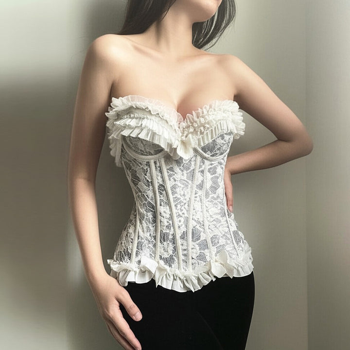 Dame spids-bustier med ruffles detaljer og sløjfer Skovae