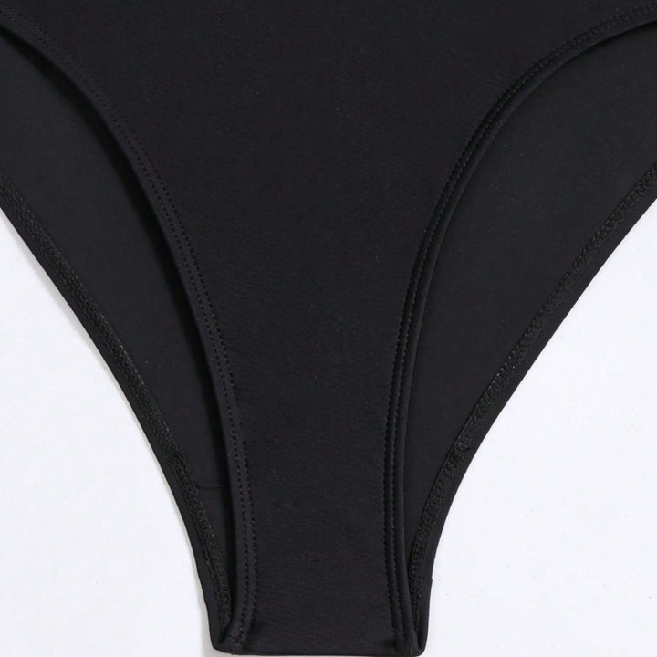 Dame Cut-Out Badedragt med elegant udskæring og moderne detaljer Stilla