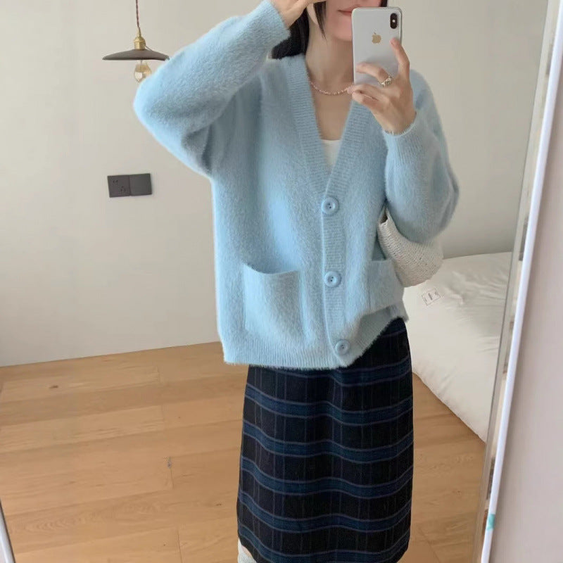Kvinders fluffy knap cardigan med elegante lommer Stilla