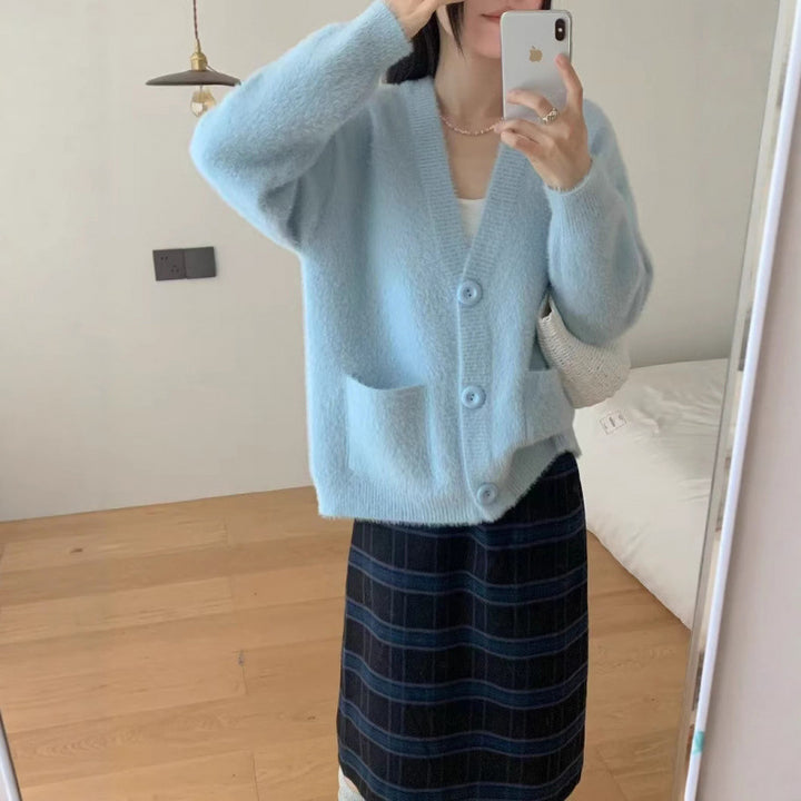 Kvinders fluffy knap cardigan med elegante lommer Stilla