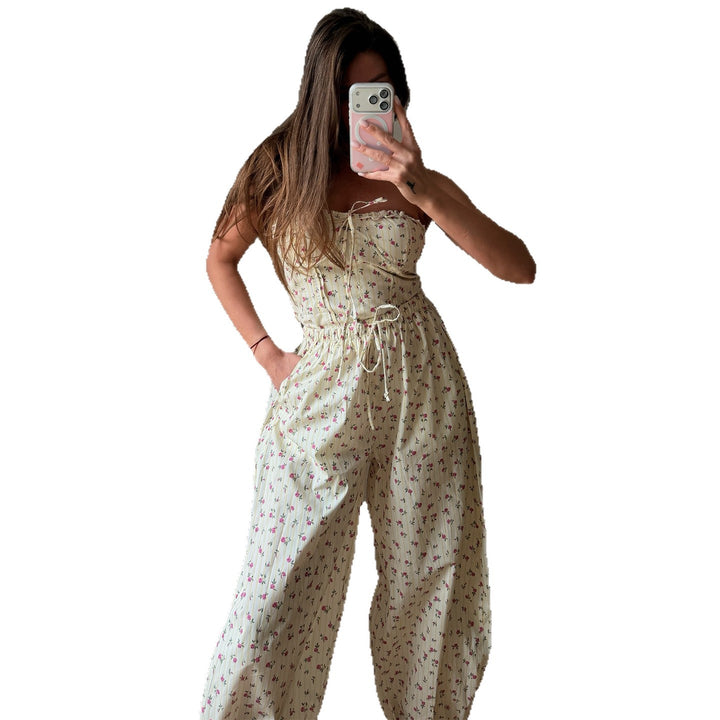 Dame jumpsuit med legende blomsterprint og elastisk taljebånd Skovae
