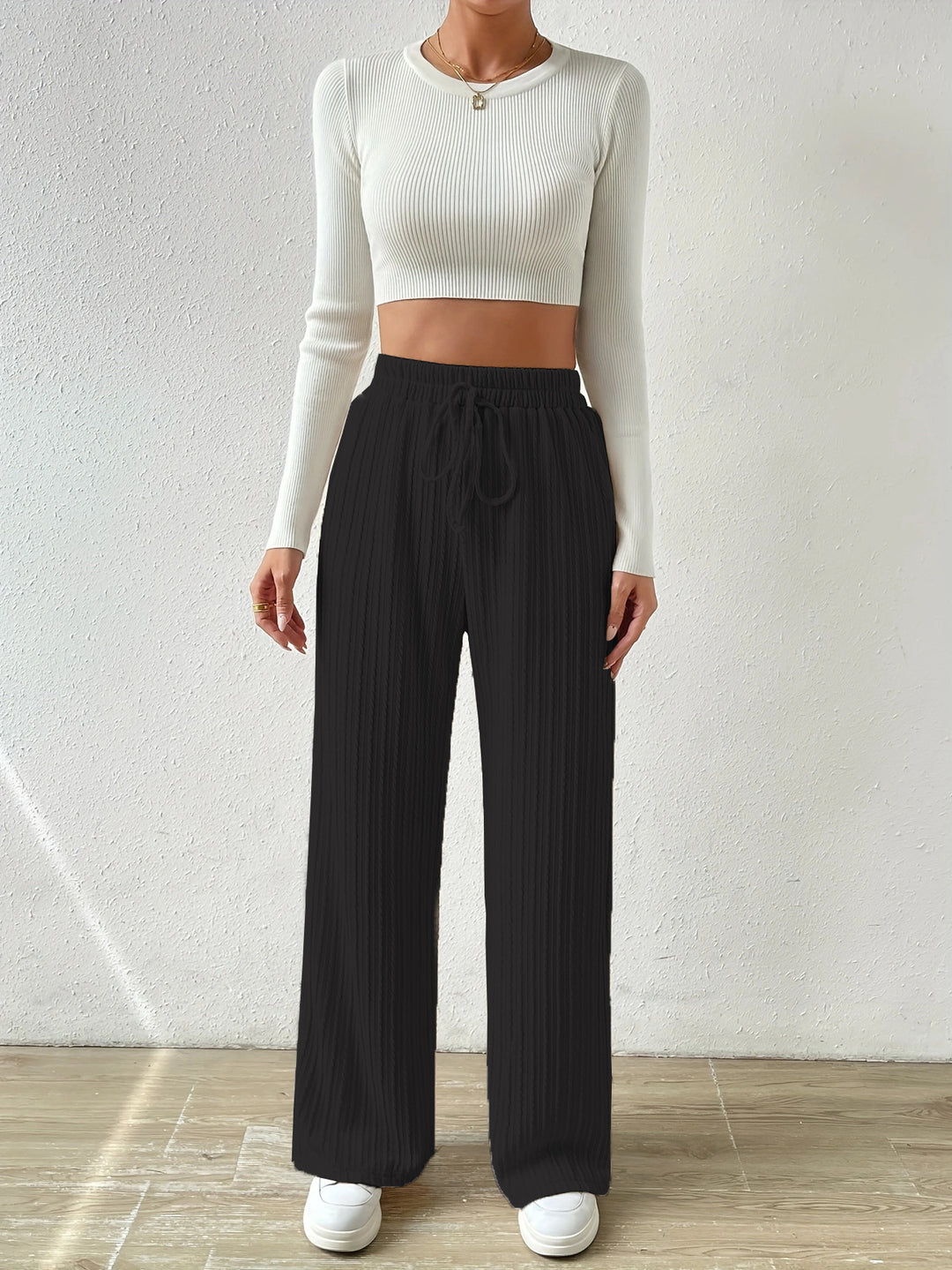 Dame afslappet lounge-sæt med strækbart crop-top og bløde palazzo-bukser Stilla