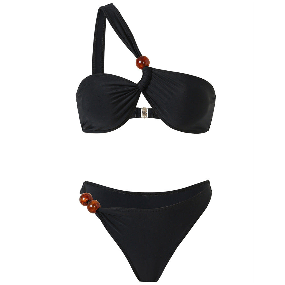 Dame Bikini-sæt med asymmetrisk Halter-neck og dekorative bukseknapper Skovae
