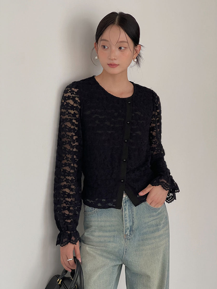 Dame elegant spidsbluse med knapdetaljer og lange ærmer Stilla