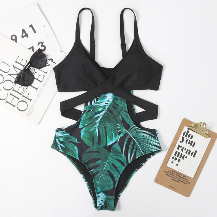 Dame jumpsuit-badedragt med floral udskæring og moderigtigt kryds-design Stilla