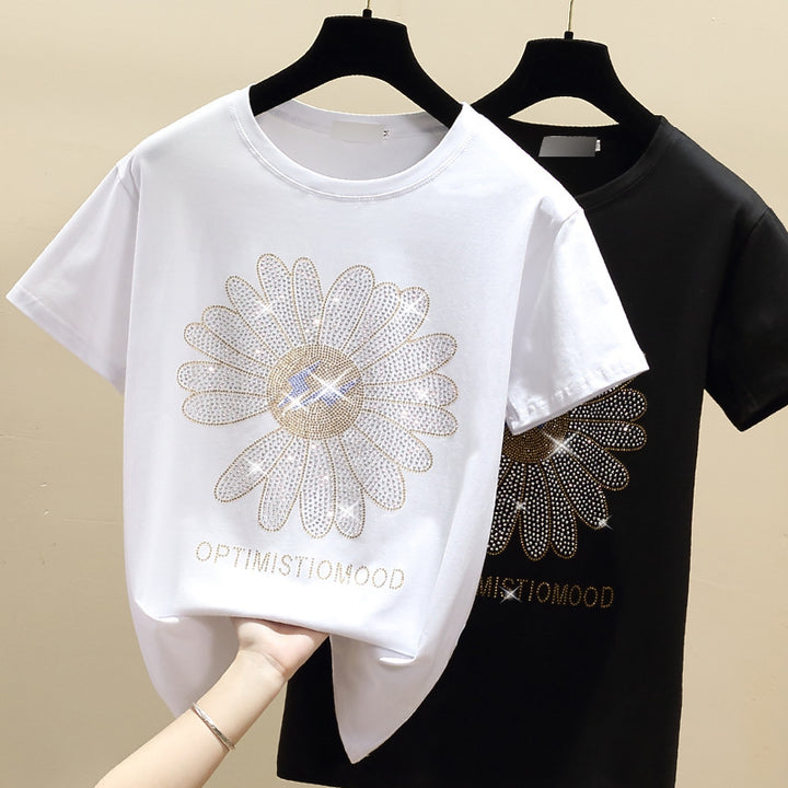 Dame T-Shirt med glitrende blomstermotiv og positiv besked Stilla