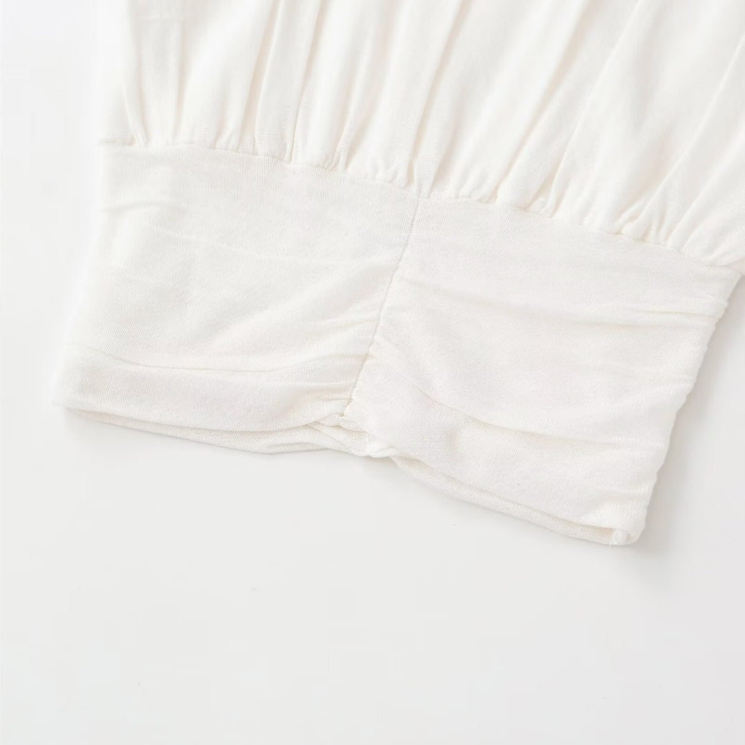 Dame mode oversized top med raffineret bånd Skovae