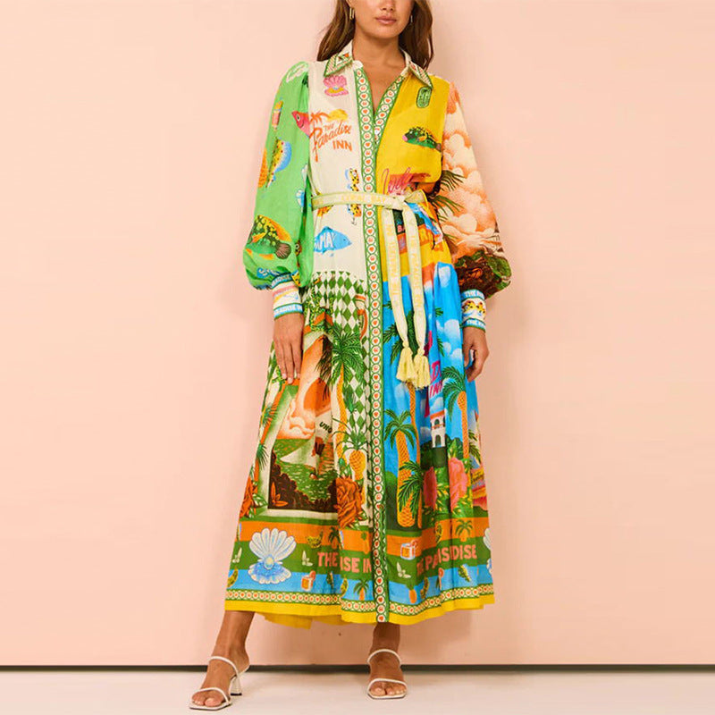 Kvinders lang kaftan kjole med farverig print og elegante pufærmer Stilla