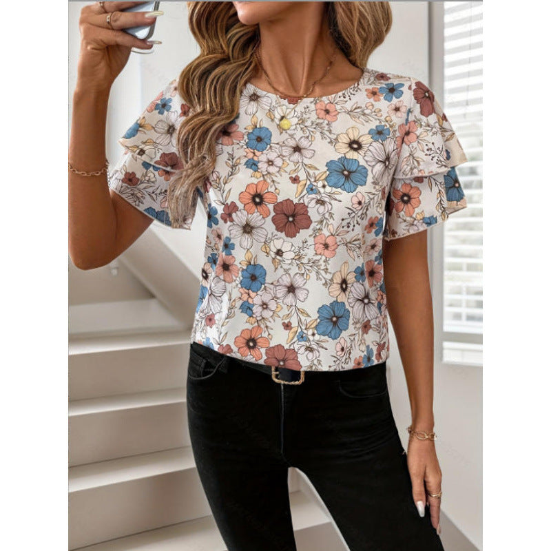 Dame kortærmet bluse med flæser og blomsterprint Skovae