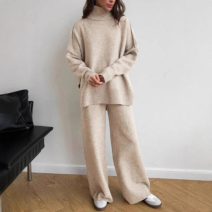 Kvinders hyggelige strikket jumpsuit med høj krave og løs pasform Skovae
