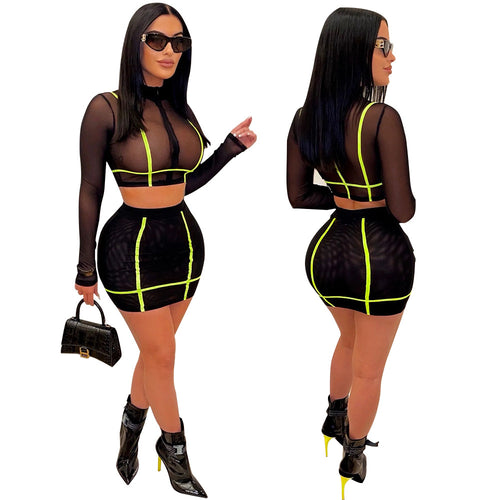 Dame sæt bestående af crop top og figursyet mini skirt med gennemsigtige detaljer Stilla