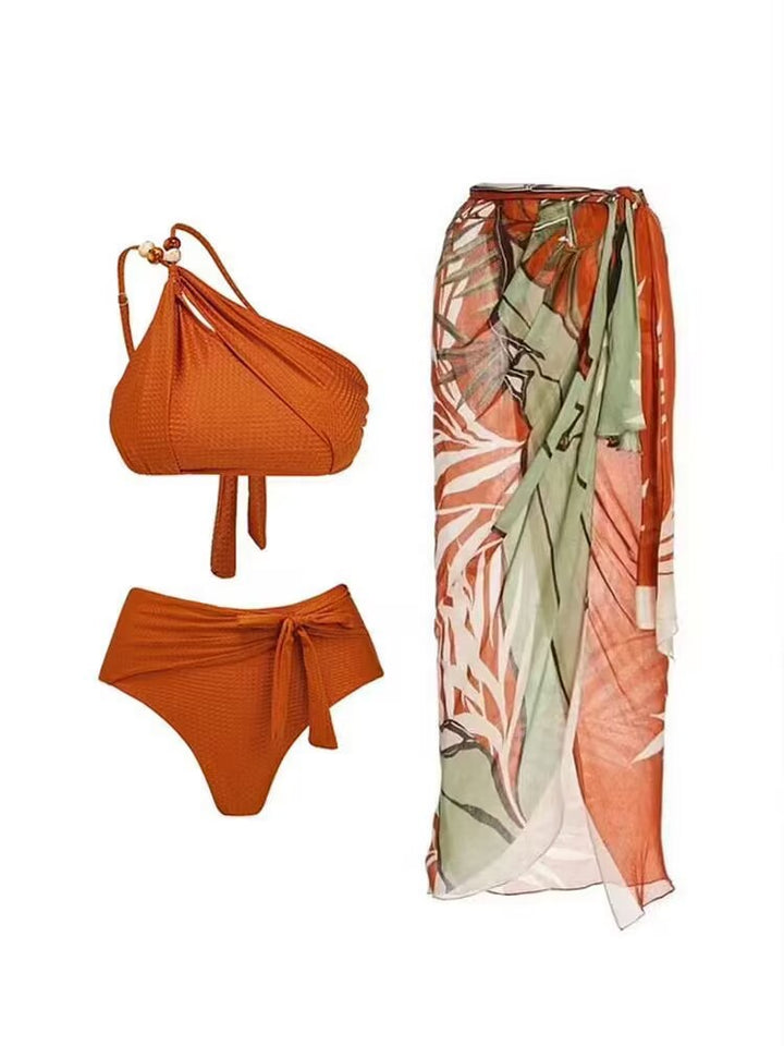 Dame badedragt sæt med asymmetrisk top og elegant sarong Skovae