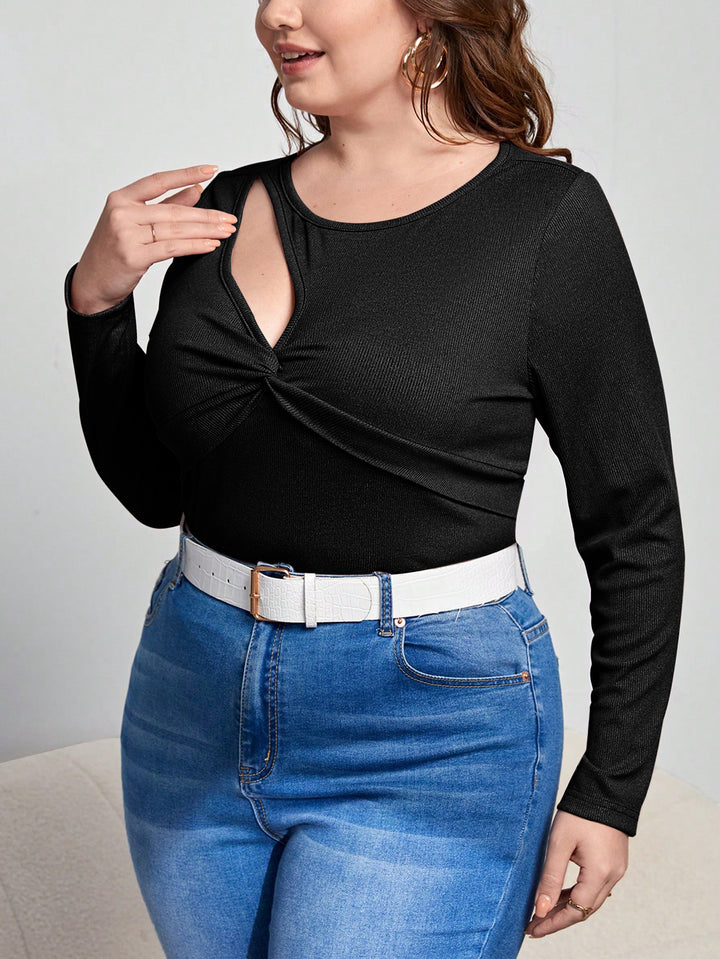 Dame stilfuld langærmet skjorte med elegant knudedesign og moderigtigt cut-out Stilla