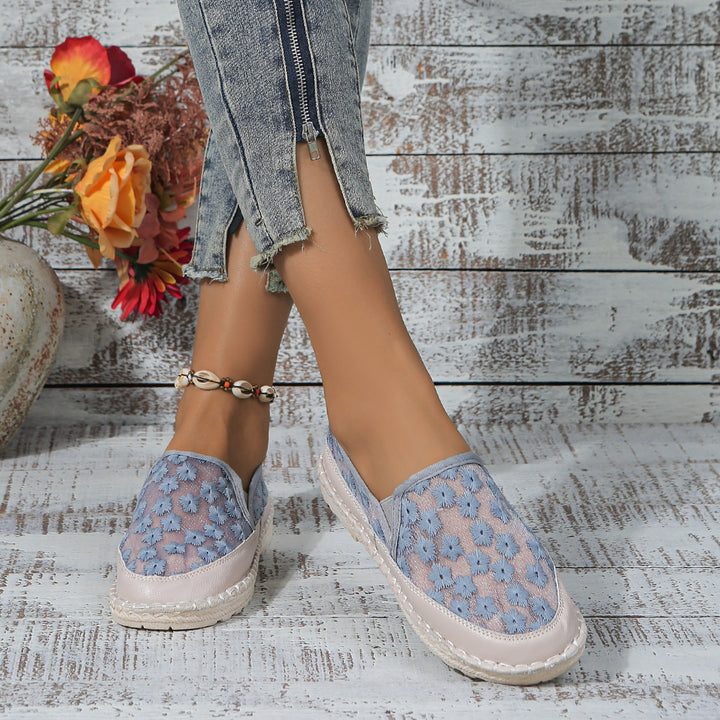Dame Slip-On Stofsko med florale accenter og skridsikker sål Stilla