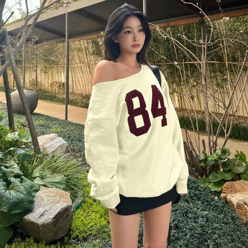 Dame Off-Shoulder Sweatshirt med sporty tryk og afslappet snit Stilla