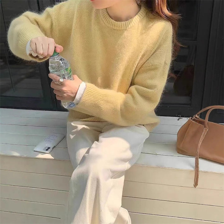 Kvinders hyggelige oversized sweater med rund halsudskæring og velkendt striktekstur Stilla